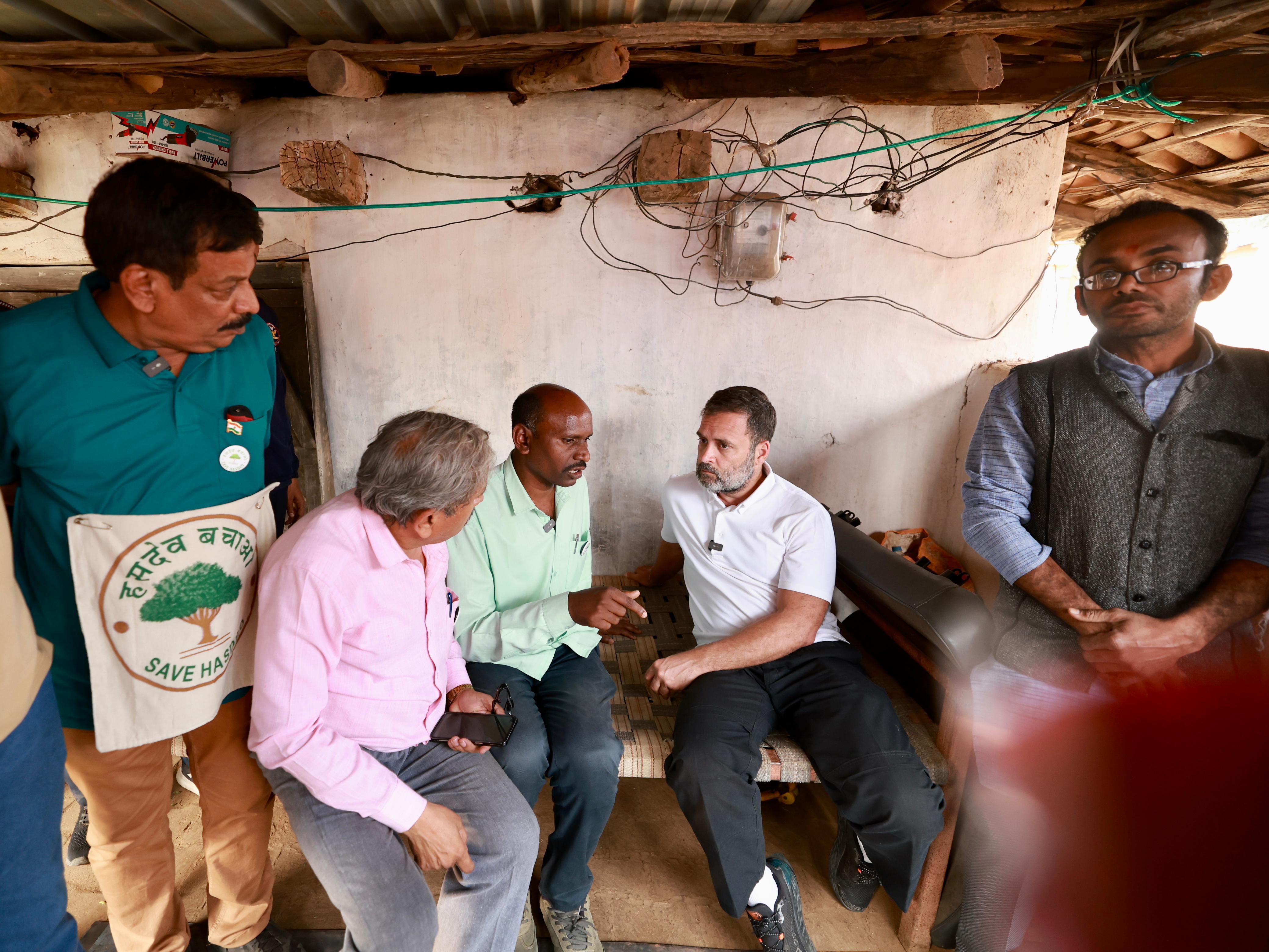 Rahul Gandhi Interacting With A Tribal Family