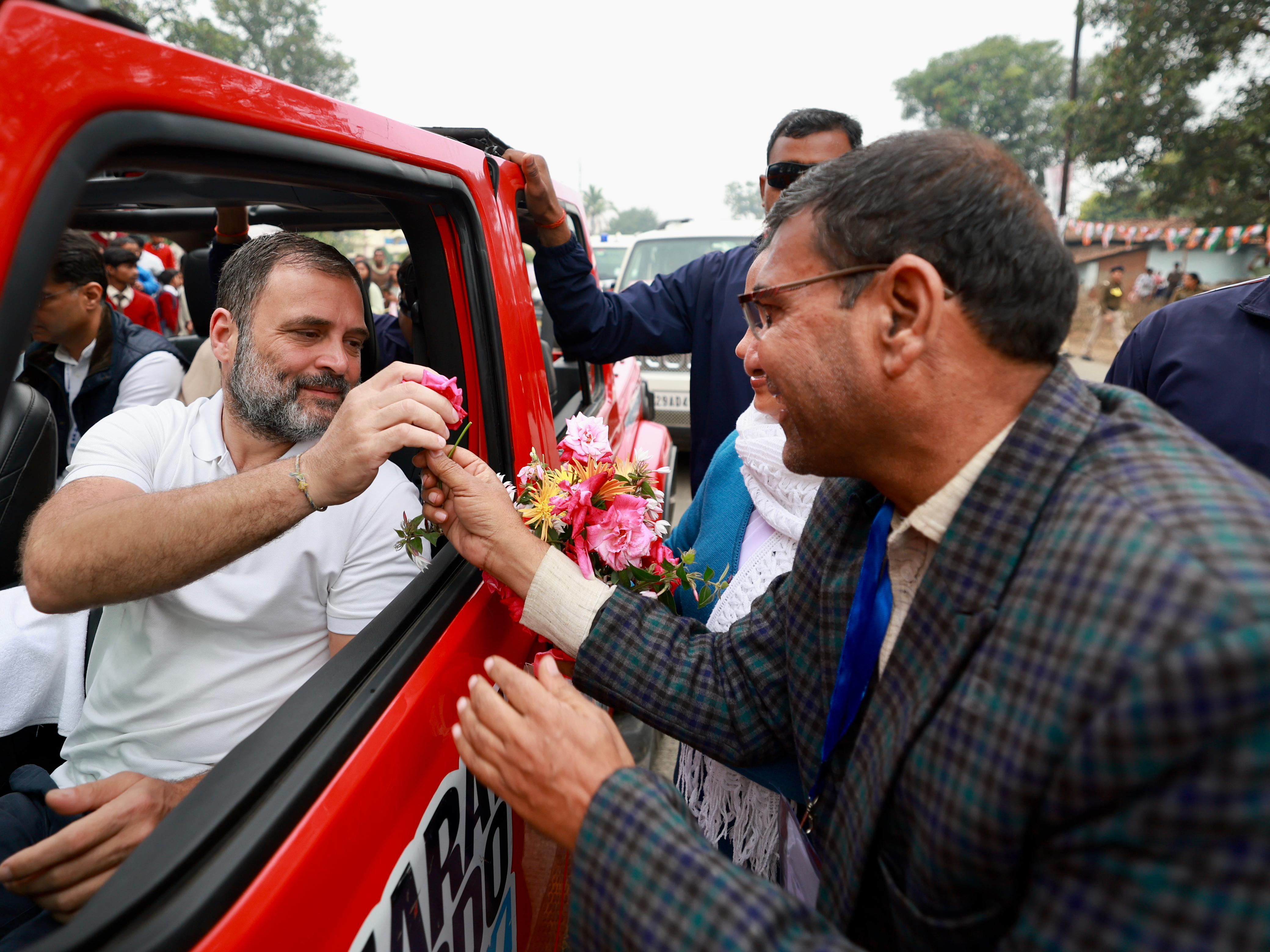 A Nyay Yoddha Gifting A Rose To Rahul Gandhi